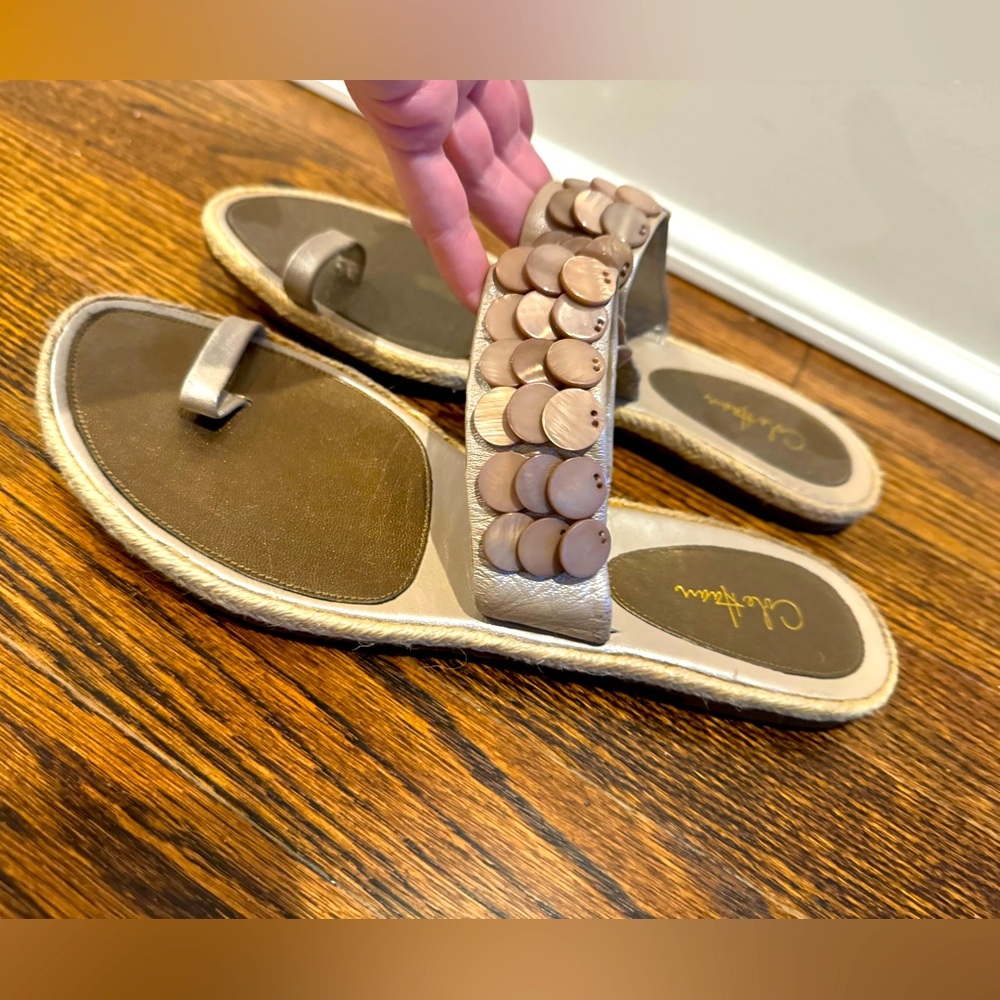 Women’s Cole Haan gold, pewter, flat shell sandals size 9